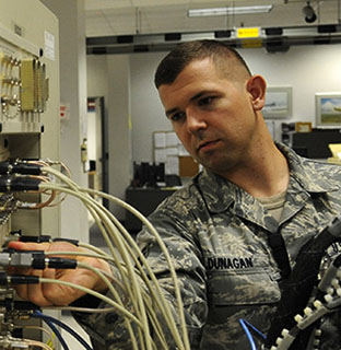 RF technician working on cables